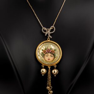 Two-sided necklace of miniature art and penmanship