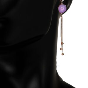 A copper metal earring with gold plating and geode agate stone