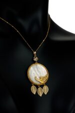 Copper and brass metal necklace with gold plating and shell stone