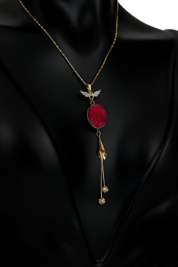 Necklace made of copper and brass metal with gold plating and geode agate stone