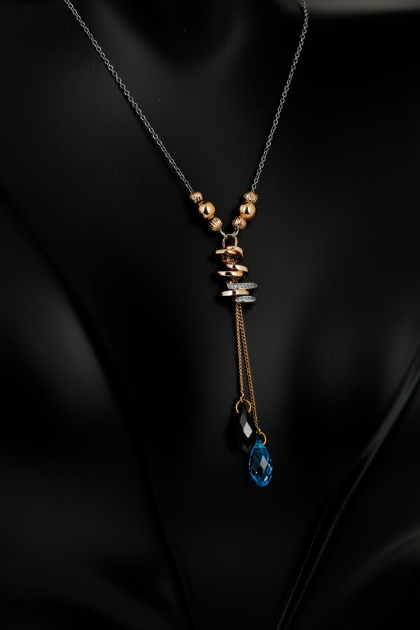 Steel and copper necklace with gold plating and synthetic drop stones