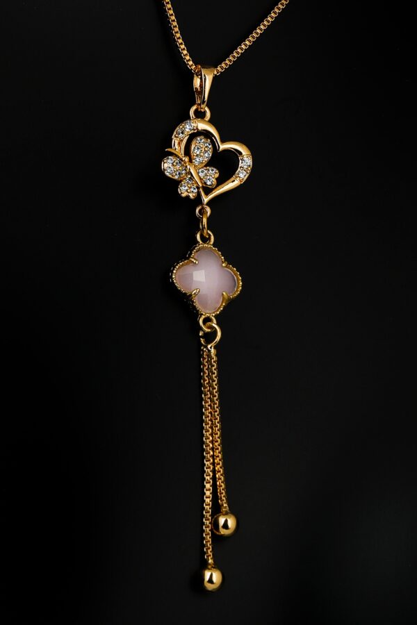 Necklace made of copper metal with gold plating and synthetic rose quartz